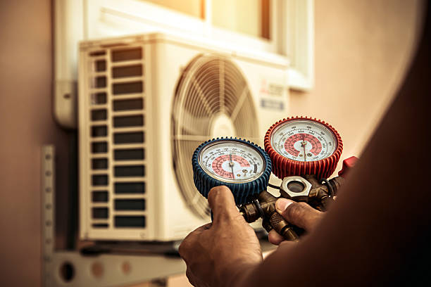 Professional Hvac technician working in Jamestown, ND
